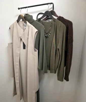new clothes hanging on a rack and ready to enhance your new image
